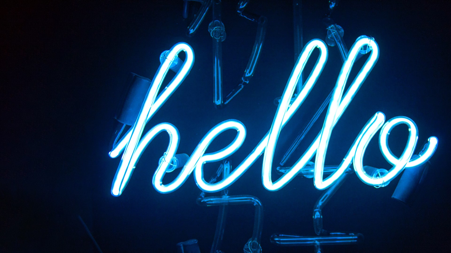 Neon blue sign that says 'hello'. 